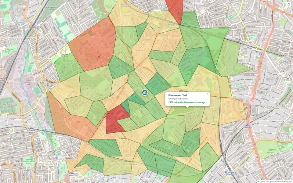 Crime heatmap for a UK postcode, showing reported-crime hotspot areas in colour around a central property pin, with a tooltip showing the crime count and local authority comparison.